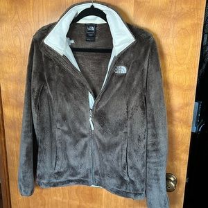 Women’s size medium north face zip up.